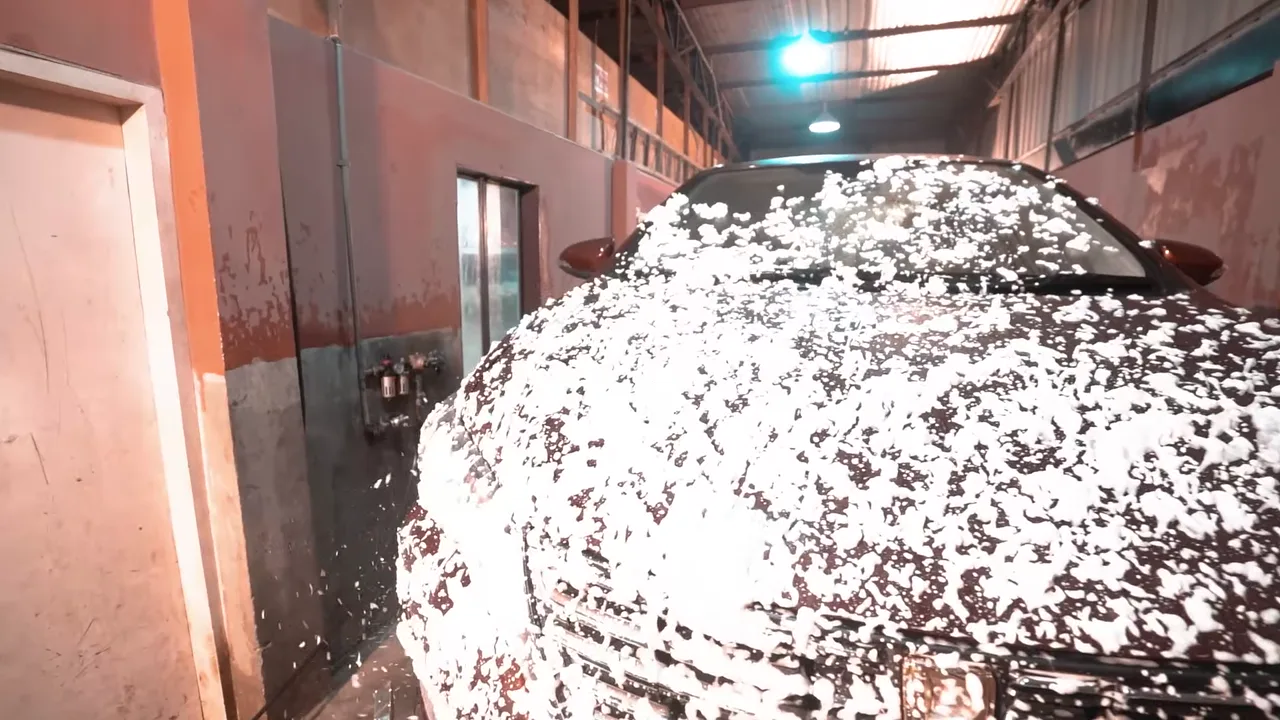 Vehicle receiving a foam wash at KSA Motors